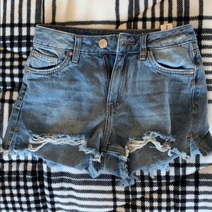 light blue ripped shorts